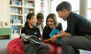 Rundle College | elementary students in the library | private school calgary