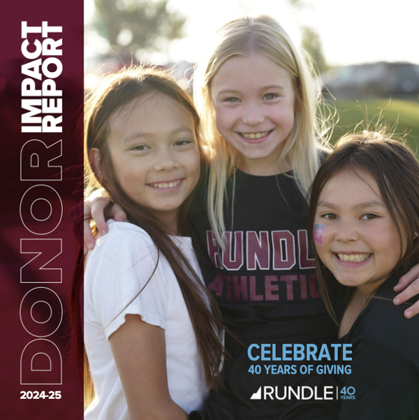 The cover of Rundle's 2024-25 Donor Impact Report depicts three young students posing together with arms around one another.